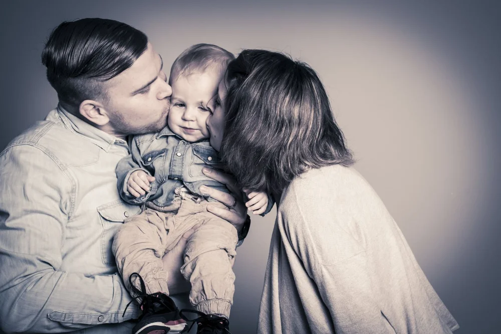 Eltern mit ihrem kleinen Kind – Originalaufnahme von MuKiLein